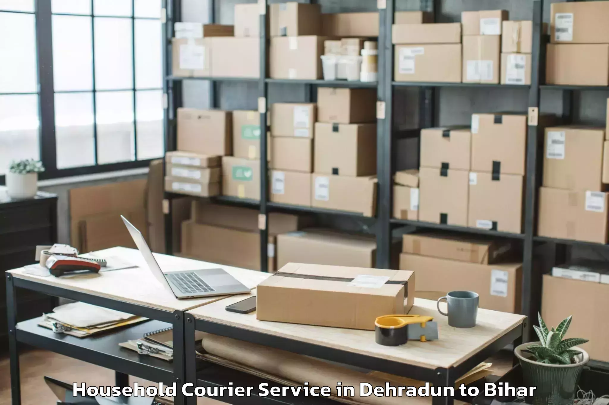 Trusted Dehradun to Chaugain Household Courier